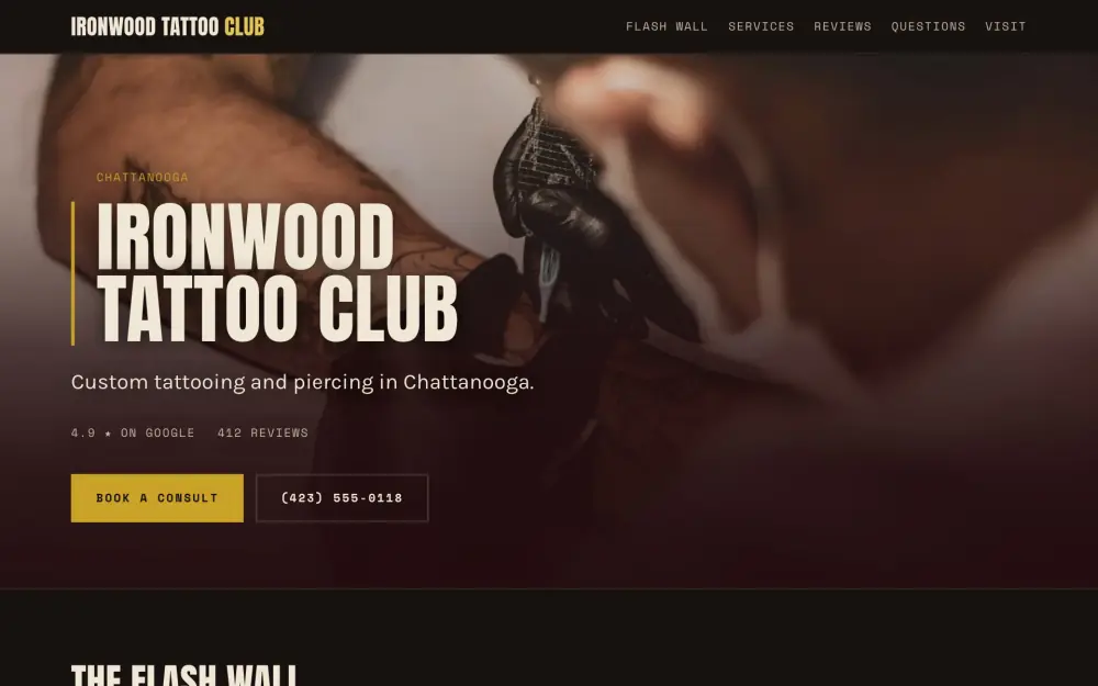 Home page of the Ironwood Tattoo Club demo site: a dark oxblood hero with the studio name set large, above a wall of numbered image slots.